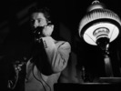 Strangers on a Train (1951)Farley Granger, camera below, light and telephone